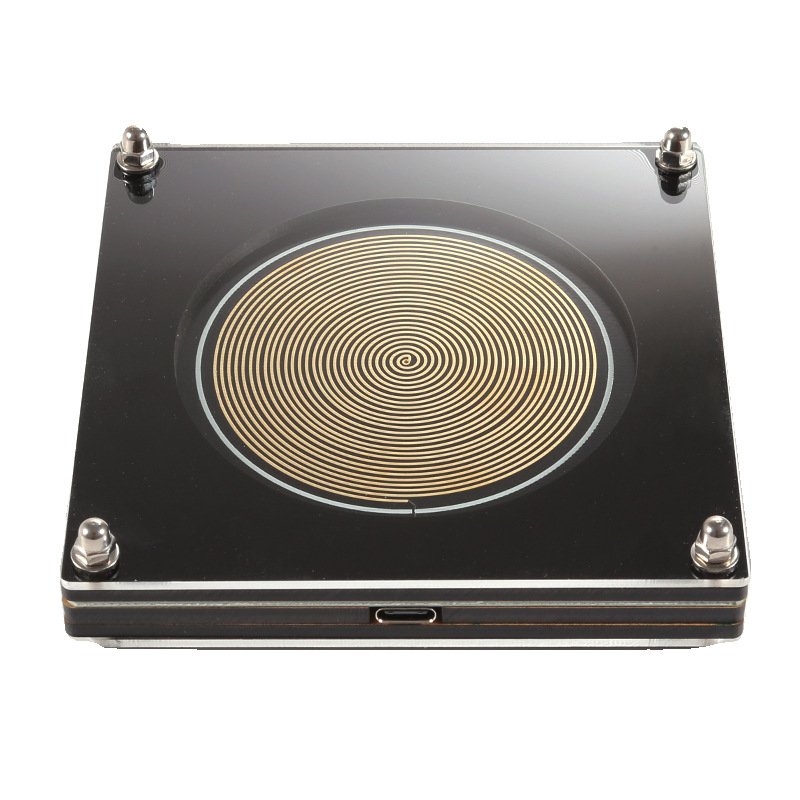 earth-tempo-device-gold-front Front view of Earth Tempo gold spiral desktop frequency device